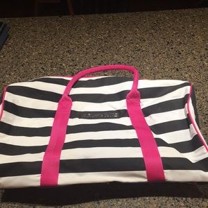 Black and white striped with hot pink handles